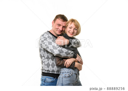 Man hugging woman, isolated on white background Man hugging woman, isolated on white background 88889256