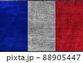 Grunge French flag on denim jeans textured abstract background concept. The National France flag on denim frabric texture. 88905447