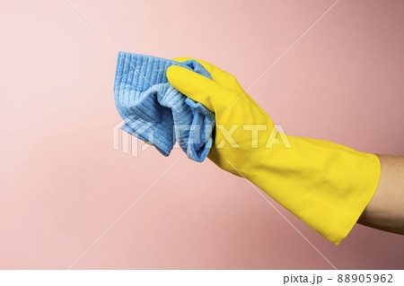 a yellow rubber cleaning glove a yellow rubber cleaning glove 88905962