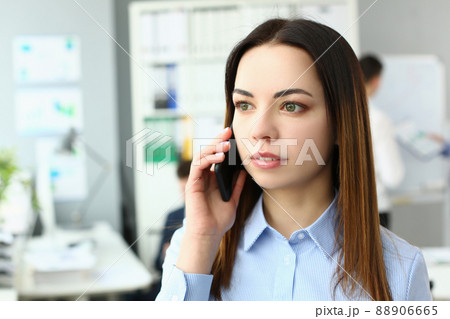 Attractive woman with mobile phone Attractive woman with mobile phone 88906665