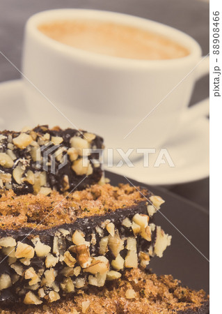 Fresh baked pastry made of zucchini and cup of coffee. Delicious dessert 88908466