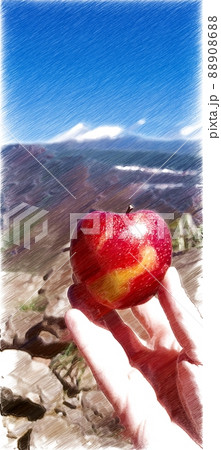 A ripe apple on the fingers of one hand with the landscape in the background. 88908688