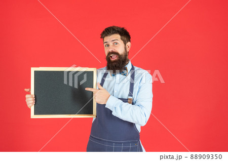 Better education for you. Surprised man point finger at school blackboard. Vocational education 88909350