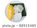 Sweet mango with sticky rice bright color and good taste in the plate on isolated background 88915485