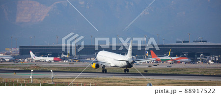 passenger plane lands at airport passenger plane lands at airport 88917522