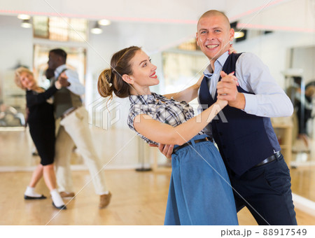 Man and woman learning to dance classical ballroom dance Man and woman learning to dance classical ballroom dance 88917549