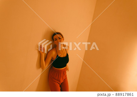 portrait of a young woman with spot light portrait of a young woman with spot light 88917861
