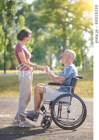 A couple spending a day in a park and looking happy 88919330
