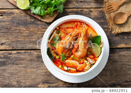 Tom Yam Kung ,Prawn and lemon soup with mushrooms, thai food in wooden bowl top view 88922951