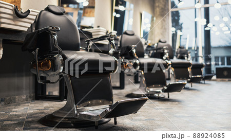 Retro armchairs in a men's barbershop Retro armchairs in a men's barbershop 88924085