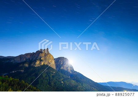 High mountains and star trails. Dolomite Alps, Italy. Landscape in the highlands at the night. 88925077