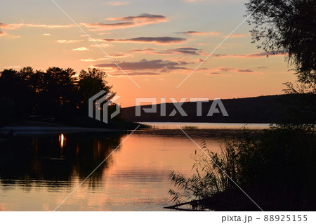 Beautiful lake in sunset lights. Scenic nature landscape. 88925155