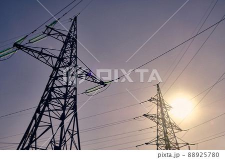 High-voltage power line against blue sky High-voltage power line against blue sky 88925780