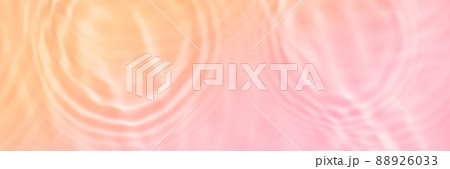 Serum or water texture close up. Light pink and coral gradient liquid gel background. Transparent beauty skincare sample. Cosmetic clear liquid cream smudge. Long banner with copy space Serum or water texture close up. Light pink and coral gradient liquid gel background. Transparent beauty skincare sample. Cosmetic clear liquid cream smudge. Long banner with copy space 88926033