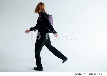 stylish hipster person holding modern backpack bag on white background stylish hipster person holding modern backpack bag on white background 88929170
