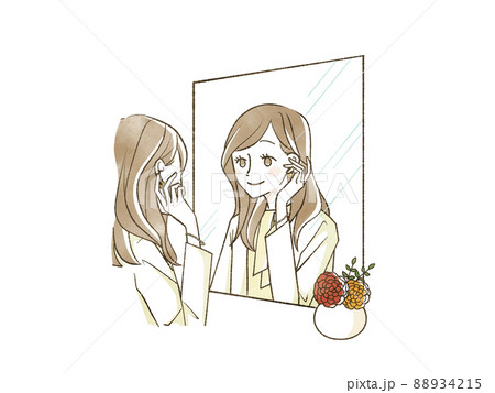 鏡を見て身だしなみを整えている女性 88934215