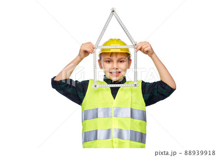 boy in helmet with ruler in shape of house 88939918