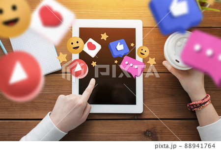 close up of hands with virtual icons and tablet pc close up of hands with virtual icons and tablet pc 88941764
