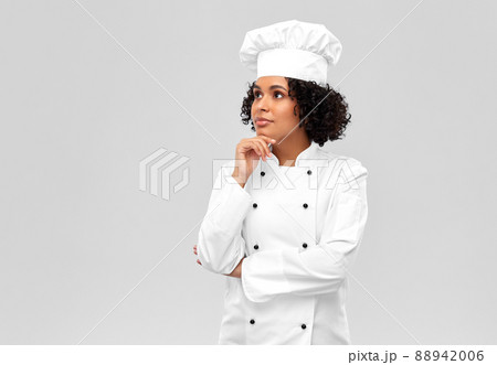 thinking female chef over grey background 88942006