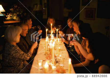 Group of friends celebrating in restaurant 88942666