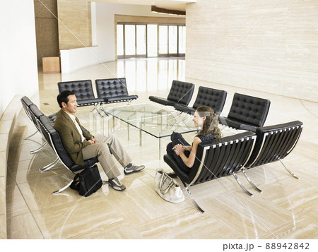 Business executives in modern office Business executives in modern office 88942842