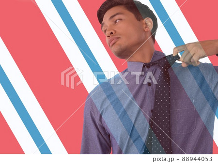 Asian businessman removing his tie against american flag design background with copy space Asian businessman removing his tie against american flag design background with copy space 88944053
