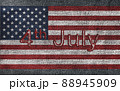 4th of July text on American flag on denim jeans textured abstract background concept. The National indendence day on USA flag frabric texture. 88945909