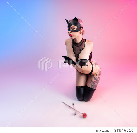 sexy woman in a leather cat mask with a leather rose bdsm in underwear sexy woman in a leather cat mask with a leather rose bdsm in underwear 88946910