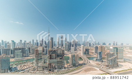 Panoramic skyline of Dubai with business bay and downtown district all day timelapse. Panoramic skyline of Dubai with business bay and downtown district all day timelapse. 88951742