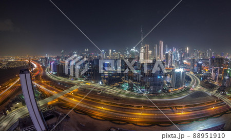 Panoramic skyline of Dubai with business bay and downtown district night timelapse. 88951910