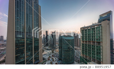 Dubai international financial center skyscrapers aerial day to night timelapse. Dubai international financial center skyscrapers aerial day to night timelapse. 88951957