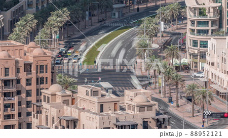 Intersection traffic timelapse on Mohammed Bin Rashid Boulevard curves among the many skyscrapers and towers Intersection traffic timelapse on Mohammed Bin Rashid Boulevard curves among the many skyscrapers and towers 88952121