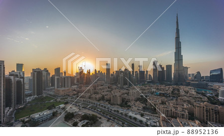 Dubai Downtown day to night transition timelapse with tallest skyscraper and other towers 88952136