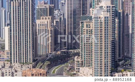 Intersection traffic timelapse on Mohammed Bin Rashid Boulevard curves among the many skyscrapers and towers 88952168