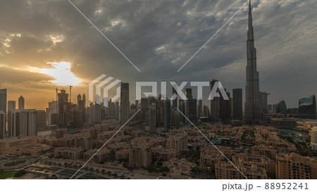 Sunset over Dubai Downtown timelapse with tallest skyscraper and other towers 88952241