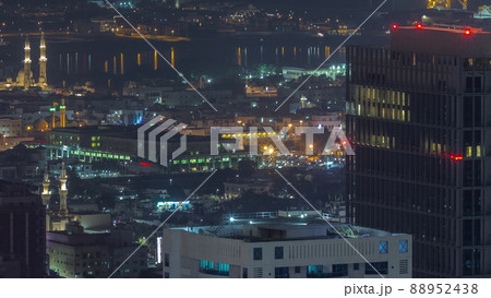 Aerial view of apartment houses and villas in Dubai city night timelapse, United Arab Emirates 88952438