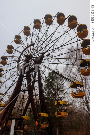 Abandoned Ferris Wheel in the amusement park of ghost town Pripyat in Chernobyl Exclusion Zone, Ukraine 88953545