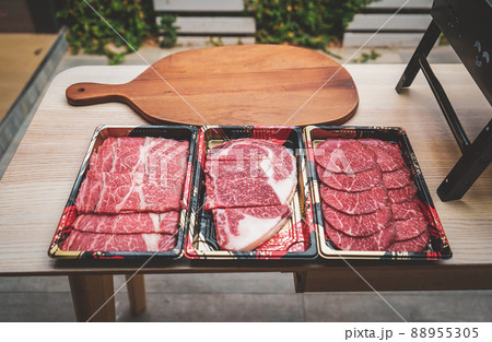Sliced fresh meat for steaks or barbecue grilled party at home. Sliced fresh meat for steaks or barbecue grilled party at home. 88955305