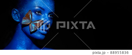 Fashion model woman with blue butterfly 88955836
