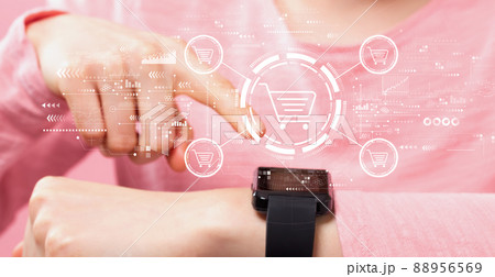 Online shopping theme with woman pressing smart watch Online shopping theme with woman pressing smart watch 88956569