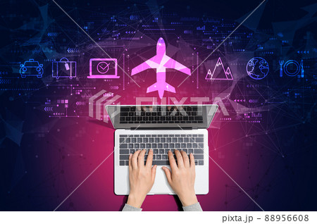 Flight ticket booking concept with person using laptop 88956608