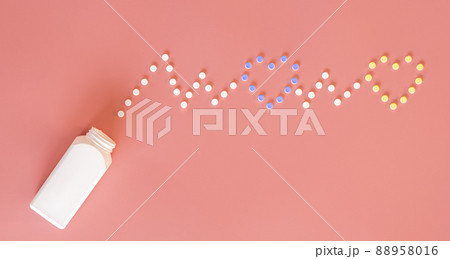 Pills on pink background, flat lay, medicine concept. 88958016