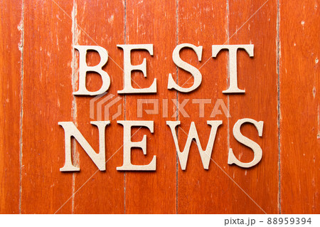 Alphabet letter in word best news on old red color wood plate background Alphabet letter in word best news on old red color wood plate background 88959394