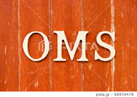 Alphabet letter in word OMS (Abbreviation of Order management system or Operations management system) on old red color wood plate background Alphabet letter in word OMS (Abbreviation of Order management system or Operations management system) on old red color wood plate background 88959478