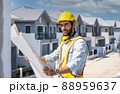 Engineer working on construction building site,Architects discussing project of building outdoors. 88959637