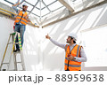 Engineer working on construction building site,Architects discussing project of building outdoors. 88959638