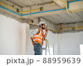 Construction engineering worker talking on radio,Construction engineer use radio communication. 88959639