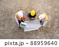 Engineer and technician team discussing in new home construction site.,Colleagues working together. 88959640