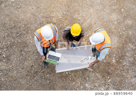 Engineer and technician team discussing in new home construction site.,Colleagues working together. 88959640
