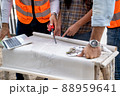 Architect and engineer meeting planning for a new project about detail of building. 88959641